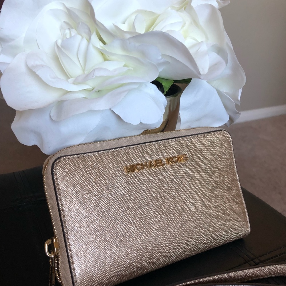 Michael Kors gold phone case and wallet